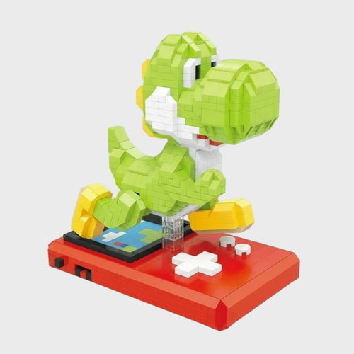 Groene dino op spelcomputer | Bouwsteentjes