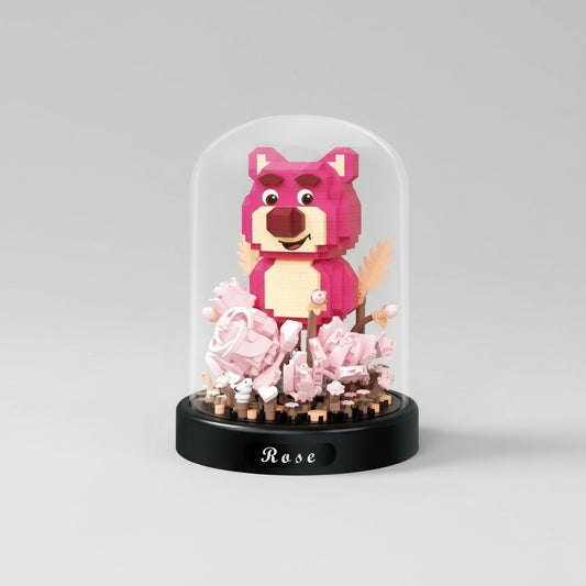 Roze beer in rozentuin | Bouwsteentjes