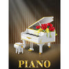 Witte Piano Met Rozen Bouwblokjes